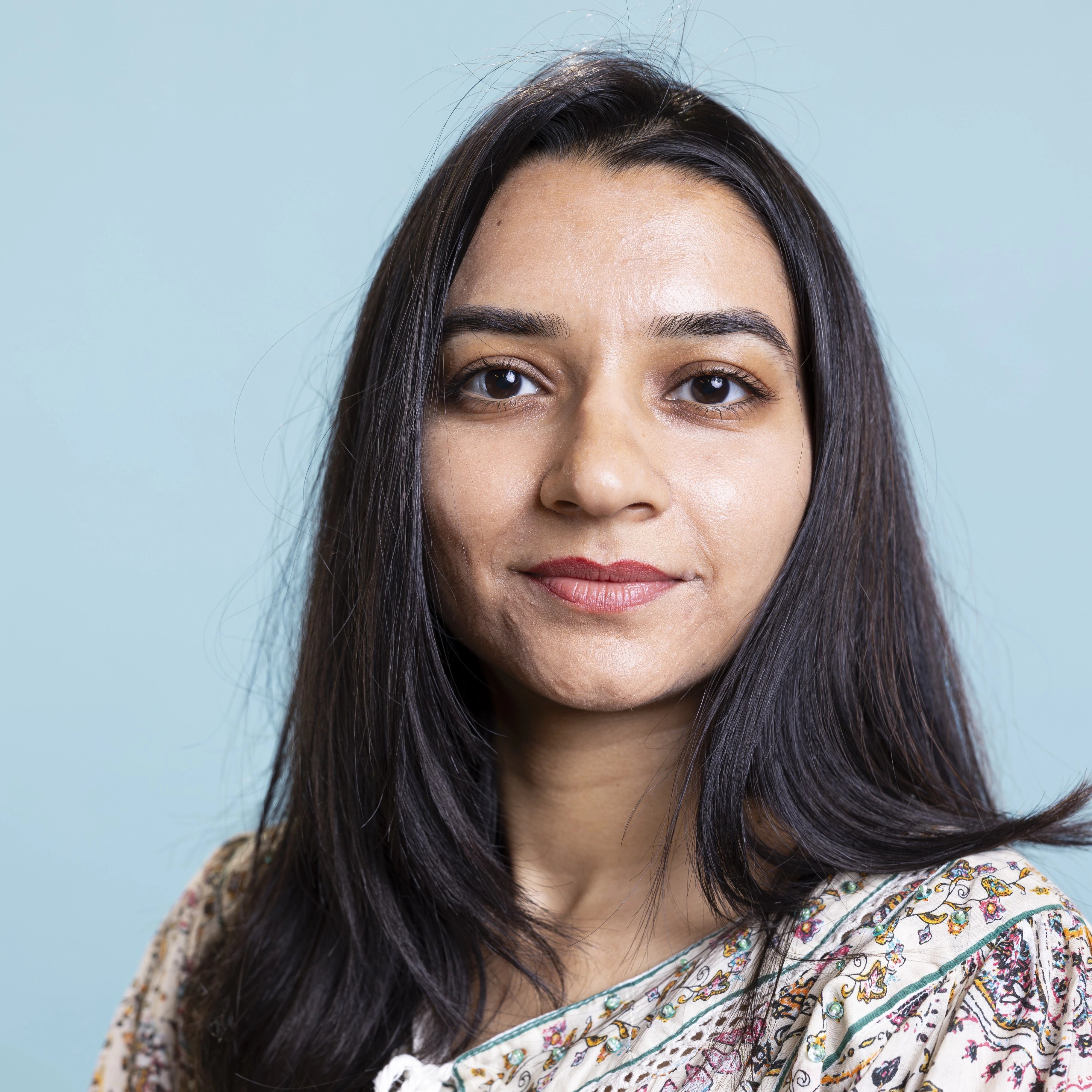 files/indian-woman-posing-cute-stylish-outfit-camera-smiling.webp